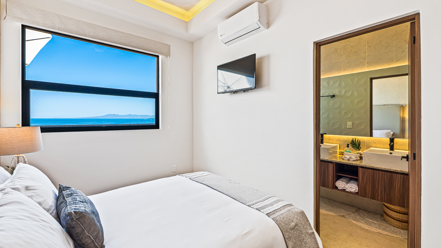 Primary bedroom with a queen bed